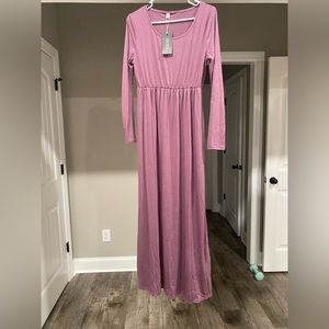 Long sleeved full length dress.